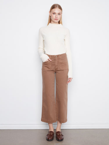 These pants feature a wide leg design, offering a relaxed silhouette perfect for any casual outing. By Charlie B.