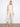 Beige cropped pants featuring a regular rise and elegant side button details, crafted in stretch twill fabric by Charlie B.
