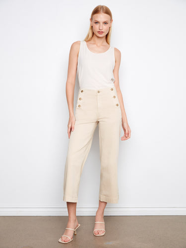 Beige cropped pants featuring a regular rise and elegant side button details, crafted in stretch twill fabric by Charlie B.