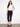 Black pants with a slim fit and stretch twill fabric, perfect for versatile styling. By Charlie B.