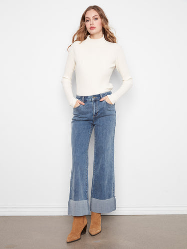 Denim jeans featuring a wide leg design and cuffed hem, offering a stylish touch to any outfit by Charlie B.