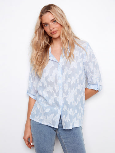 This stylish shirt features a classic collar and roll-up 3/4 sleeves, perfect for a casual yet polished look by Charlie B.