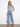 These jeans feature a stylish flared leg and floral embroidery for a chic look. Perfect for casual outings. By Charlie B.