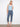 Medium blue jeans with a slim fit and five-pocket design, featuring beautiful embroidered cuffs for added style by Charlie B.