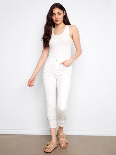 White slim-fit jeans with a regular rise and stylish embroidered hem, crafted from stretch denim for comfort by Charlie B.