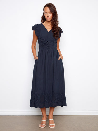 Elegant dress with a flattering empire elastic waist, perfect for any occasion. Designed by Charlie B.