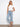 Stretch denim jeans with palm tree embroidery at the hem add a unique touch to your wardrobe. Designed by Charlie B.