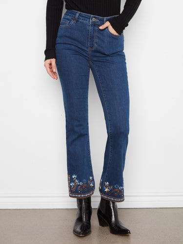 These full-length jeans come with a regular rise, offering both comfort and style. By Charlie B.