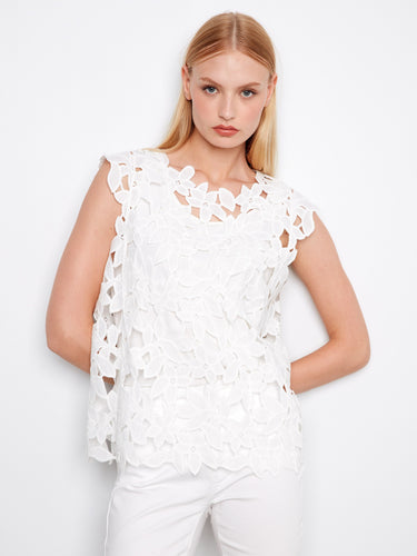 Adorned with a floral pattern, this top exudes femininity and grace, making it ideal for any occasion by Charlie B.