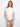 White top with cap sleeves and floral embroidery on cotton fabric, adding a touch of elegance by Charlie B.