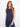 Navy cotton top with floral embroidery, highlighting its sleeveless design for a breezy feel by Charlie B.