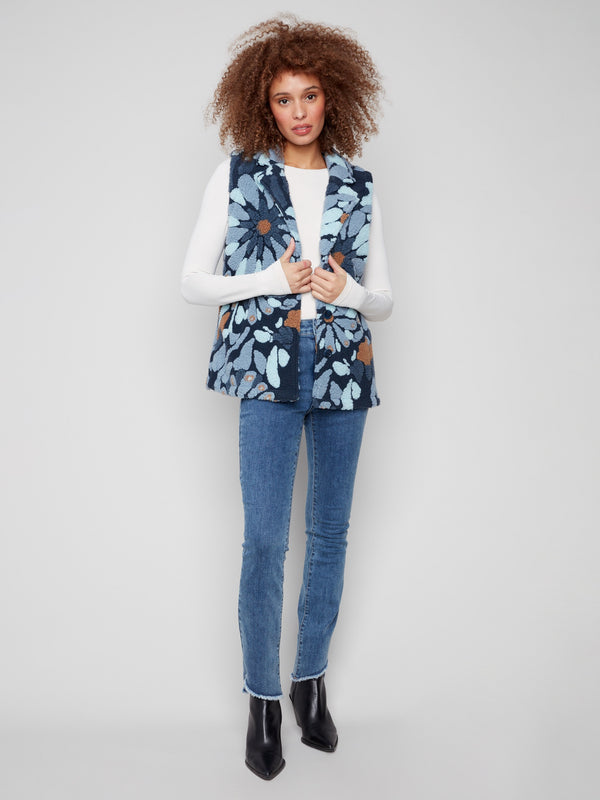 Elegant blue floral vest crafted from soft Sherpa fleece with a classic three-button closure by Charlie B.