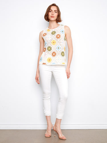 This stylish top features a crew neckline that adds a classic touch to its modern floral motif, making it versatile for any occasion by Charlie B.