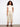 Cropped foiled twill pants with a regular rise and rectangular patch pockets, featuring snap button details by Charlie B.