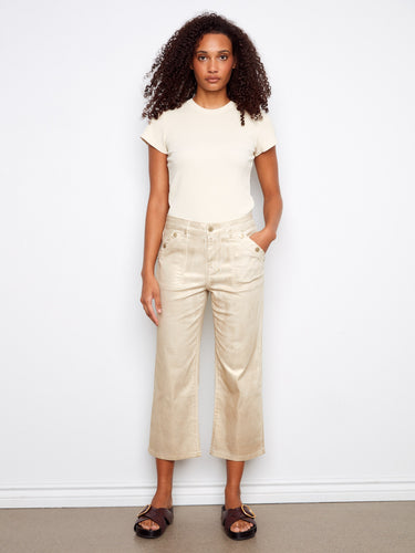 Cropped foiled twill pants with a regular rise and rectangular patch pockets, featuring snap button details by Charlie B.