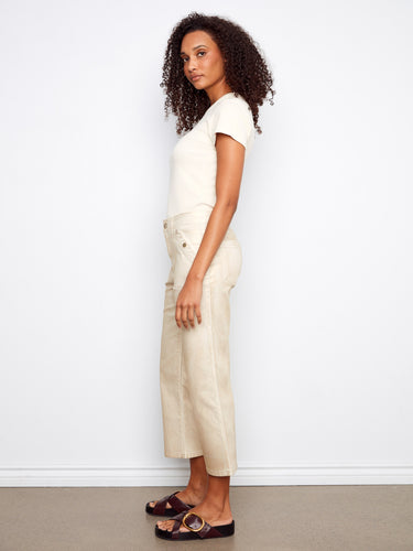 These stylish pants feature a cropped length and straight leg, enhanced by the unique foiled finish for a chic look by Charlie B.