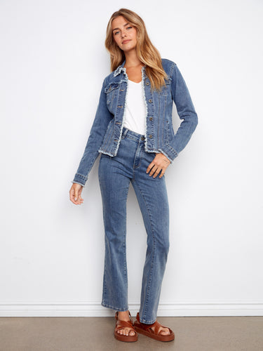This denim jacket comes with a classic button front design, adding a timeless touch to any outfit. By Charlie B.