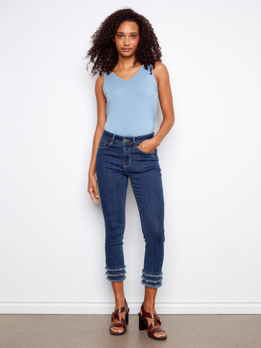 Denim jeans featuring a skinny fit, perfect for a sleek look. Crafted from stretch denim fabric for comfort. By Charlie B.