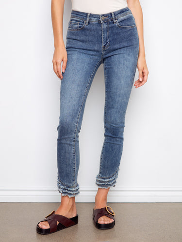 Denim pants in medium blue with a regular rise, showcasing a fashionable five-pocket design by Charlie B.