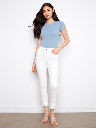 These jeans feature a skinny fit, offering a sleek and modern silhouette perfect for any occasion. By Charlie B.