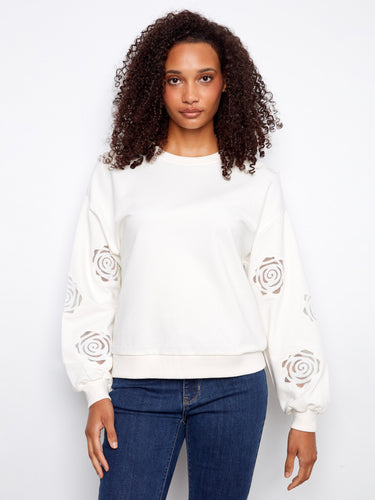 Elegant sweater featuring a crew neckline, perfect for versatile styling. Made from soft stretch cotton for all-day comfort by Charlie B.