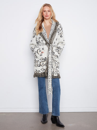 This cozy cardigan features a shawl collar, adding elegance and warmth to your outfit. Perfect for chilly days. By Charlie B.