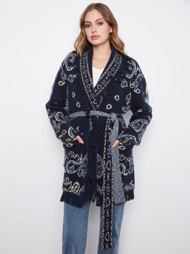 Fringed navy cardigan with geometric jacquard design, long sleeves, and practical patch pockets for added style by Charlie B.