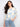 Featuring a stylish crew neckline, this top showcases a vibrant handcrafted crochet design in pastel hues. By Charlie B.