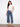 Medium blue wide-leg jeans with a cropped length, featuring heart cutouts and a five-pocket design by Charlie B.