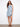 Floral dress featuring a stylish Henley neckline and vibrant blue pattern, perfect for any casual outing. By Charlie B.