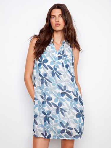 Chic floral dress with a convenient chest pocket and elegant half-button design, ideal for effortless style. By Charlie B.