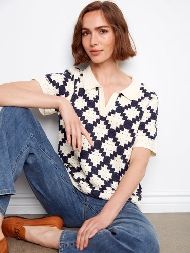 This stylish navy and cream crochet top showcases a beautiful Johnny collar with its unique design by Charlie B.
