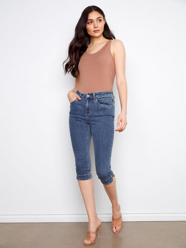 Medium blue capri jeans with a comfortable regular rise and five-pocket design, ideal for casual wear by Charlie B.