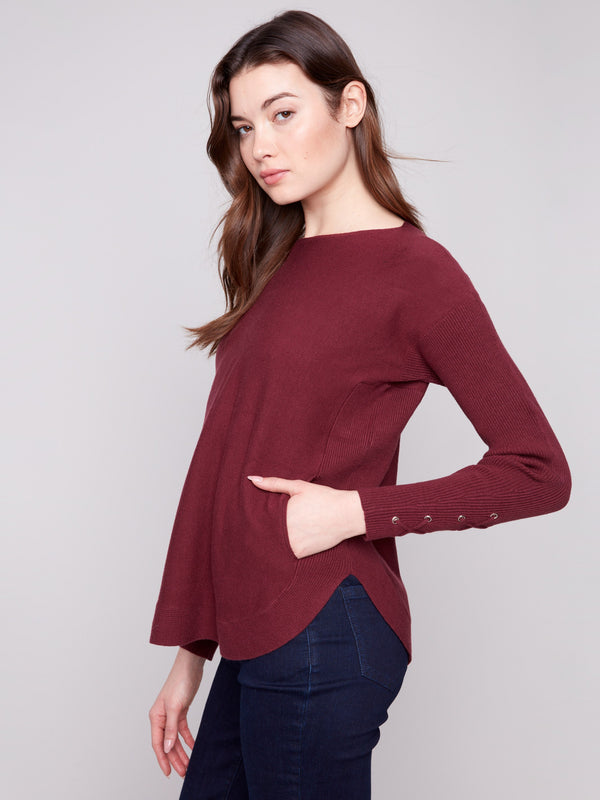 Cabernet knit sweater with practical side pockets, perfect for keeping essentials close by Charlie B.