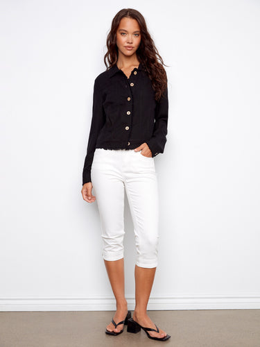 The jacket showcases stylish frayed edges, adding a touch of casual elegance to any ensemble. Designed by Charlie B.