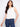White sleeveless top with a loose fit, perfect for casual outings, by Charlie B.
