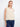 Ivory sleeveless top with a loose fit and scalloped hem, perfect for a casual look by Charlie B.