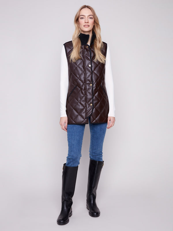 Hip-length quilted vest in mocha with snap button closure, perfect for layering by Charlie B.
