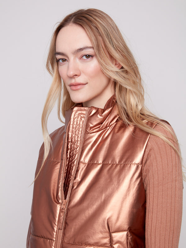 Elegant copper sleeveless vest designed with zipper front closure by Charlie B.