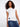 This white top features a stylish crew neckline, perfect for any casual outing. Made from 100% cotton by Charlie B.