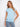 Light blue t-shirt featuring a classic crew neckline and short sleeves, crafted from 100% cotton for comfort. By Charlie B.