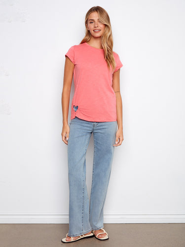 Chic pink top with heart-shaped cutout detail, adding a playful touch to your outfit. Made from breathable cotton by Charlie B.