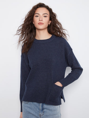 This sweater features a classic crew neck and a cozy feel, perfect for everyday wear by Charlie B.
