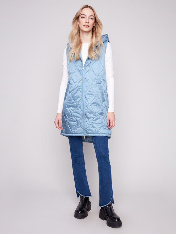 Quilted Oxford long vest featuring a zipper front closure and elegant design by Charlie B.