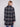 Elegant navy plaid boucle coat with practical welt pockets for functionality by Charlie B.
