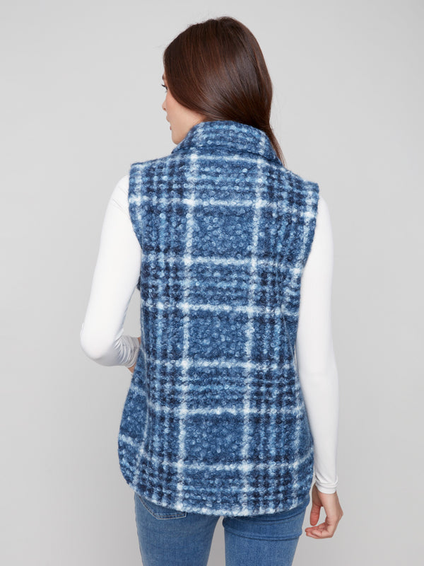 Embrace timeless style with this button front closure plaid boucle knit vest, offering comfort and flair by Charlie B.