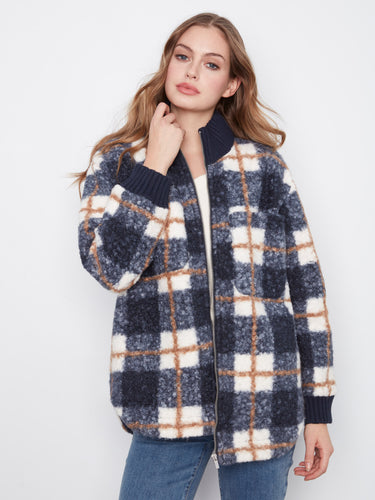 Plaid jacket featuring a zip-front closure, perfect for casual outings. By Charlie B.
