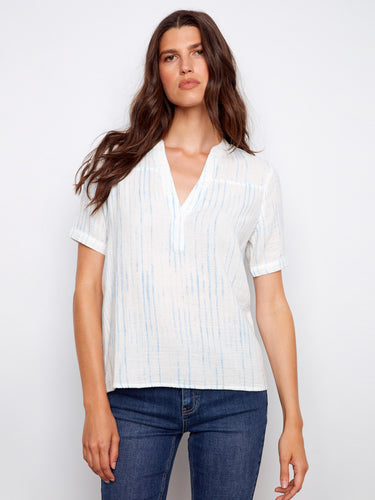 Blue striped blouse featuring a notch neckline, crafted from 100% cotton for comfort and style by Charlie B.