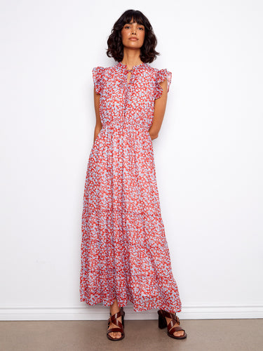 This dress features cap ruffle sleeves, enhancing its feminine appeal with a playful flair by Charlie B.