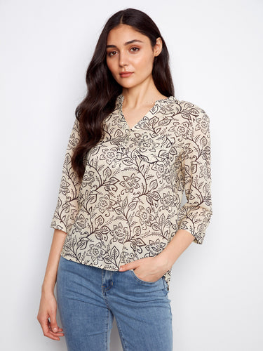 Floral blouse with a convenient chest pocket, perfect for casual outings and adding a touch of style to your wardrobe by Charlie B.